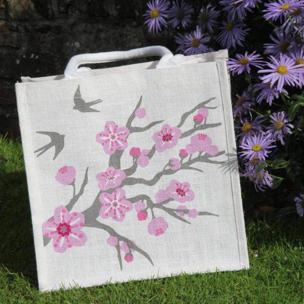 Square Jute Shopping Bag by Shared Earth - Cherry Tree with Swallows &Keep