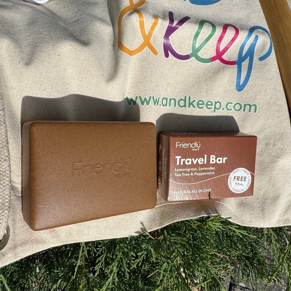 &Keep festival Travel pack + drawstring bag with eco-friendly products on a grass background